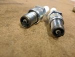 Spark plug Auto part Automotive engine part Screw Automotive ignition part