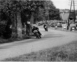 K.Bryen lapping Tommy Wood, German G.P. 1953.jpg